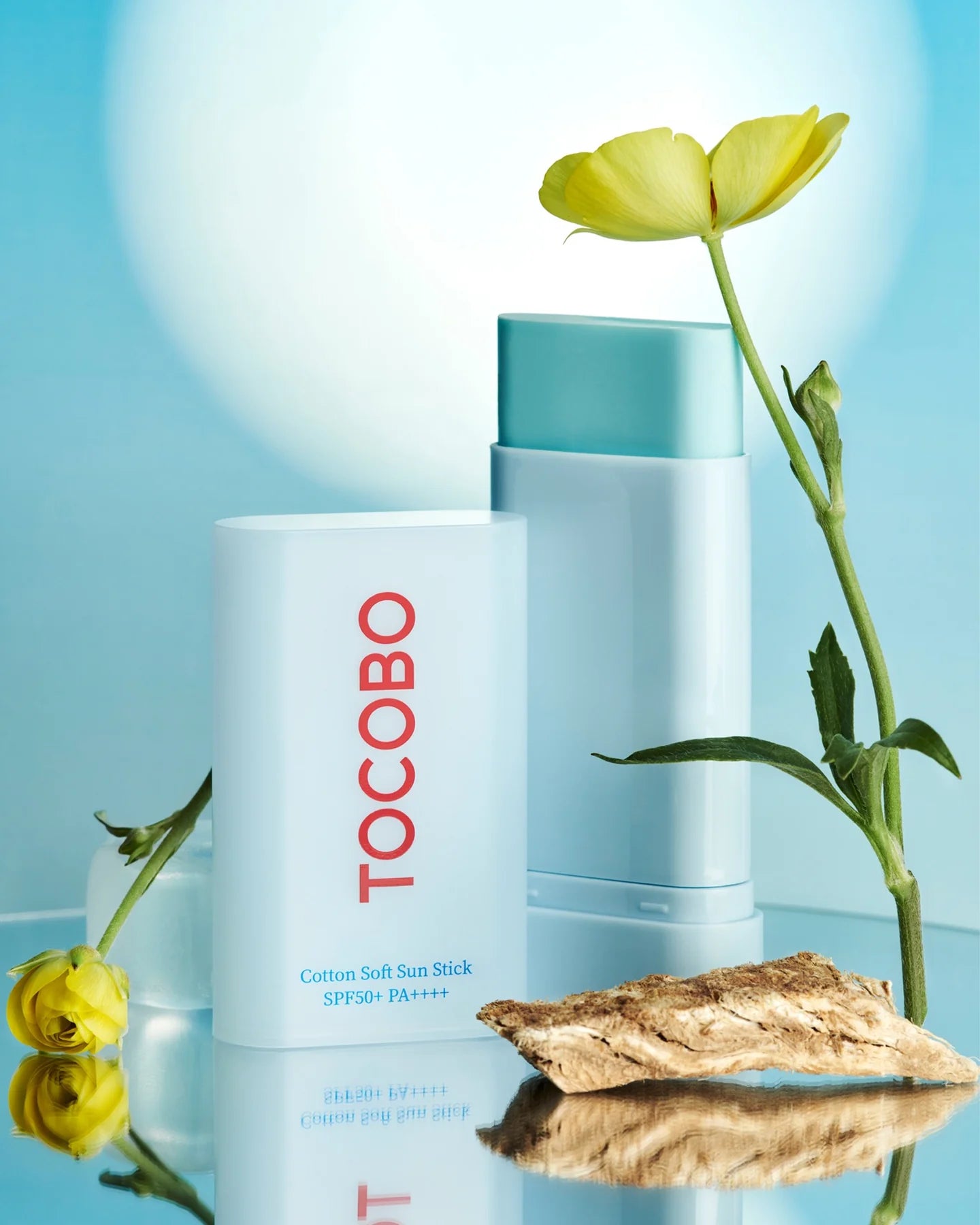 Tocobo sunstick con flor amarilla